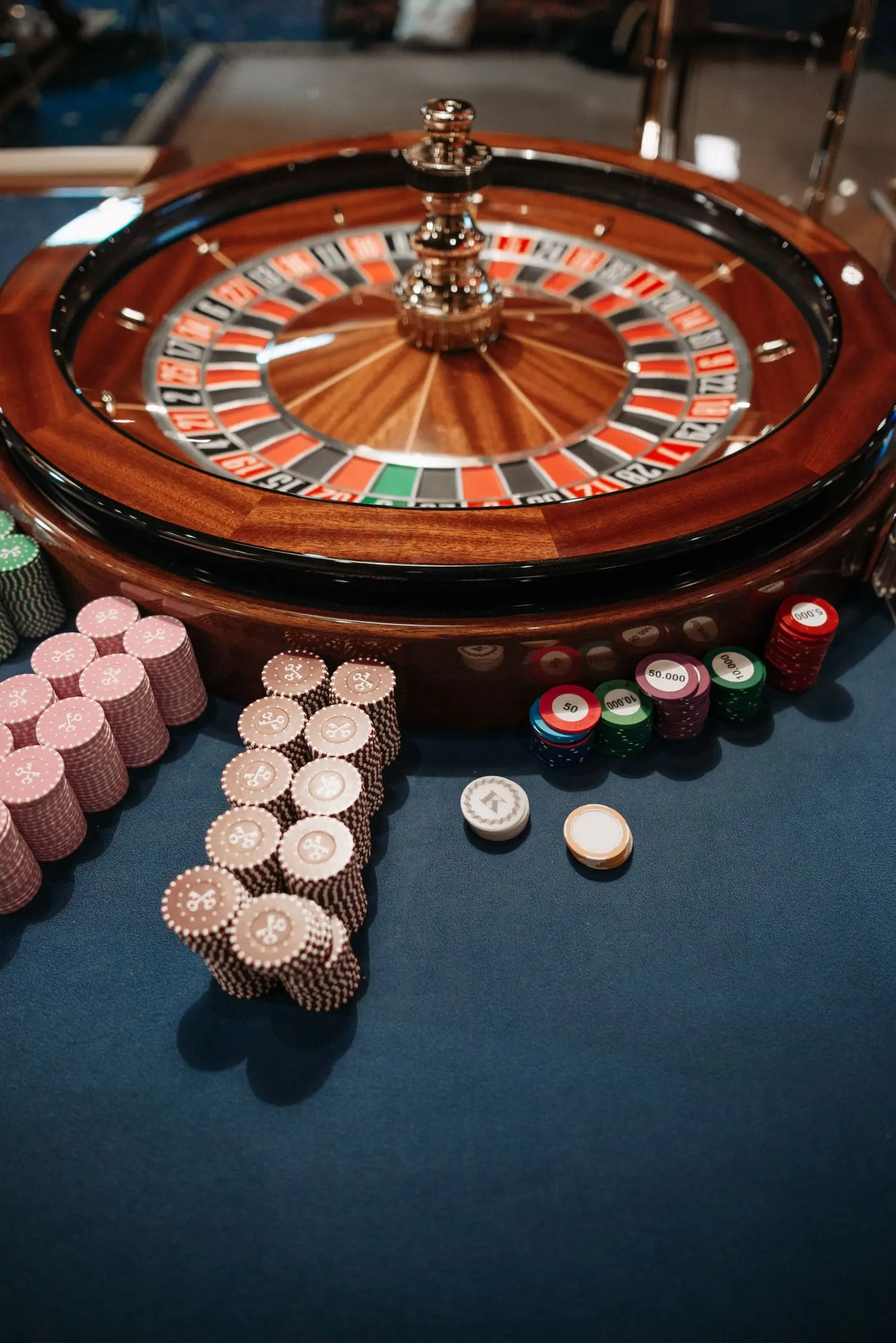 Casino gaming area with warm architectural lighting